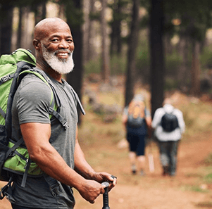a man with dentures going on a hike