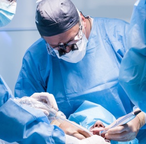 A dentist placing dental implants