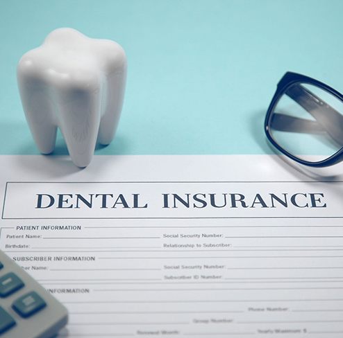 Dental insurance form on blue background